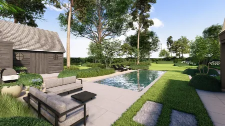 Loungezone met ligbedden naast het zwembad in het tuinontwerp voor Bonheiden