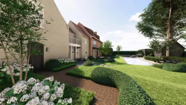 Ontwerp van landschapstuin in Bonheiden met kasseipad tussen glooiend gazon en witte hortensia's
